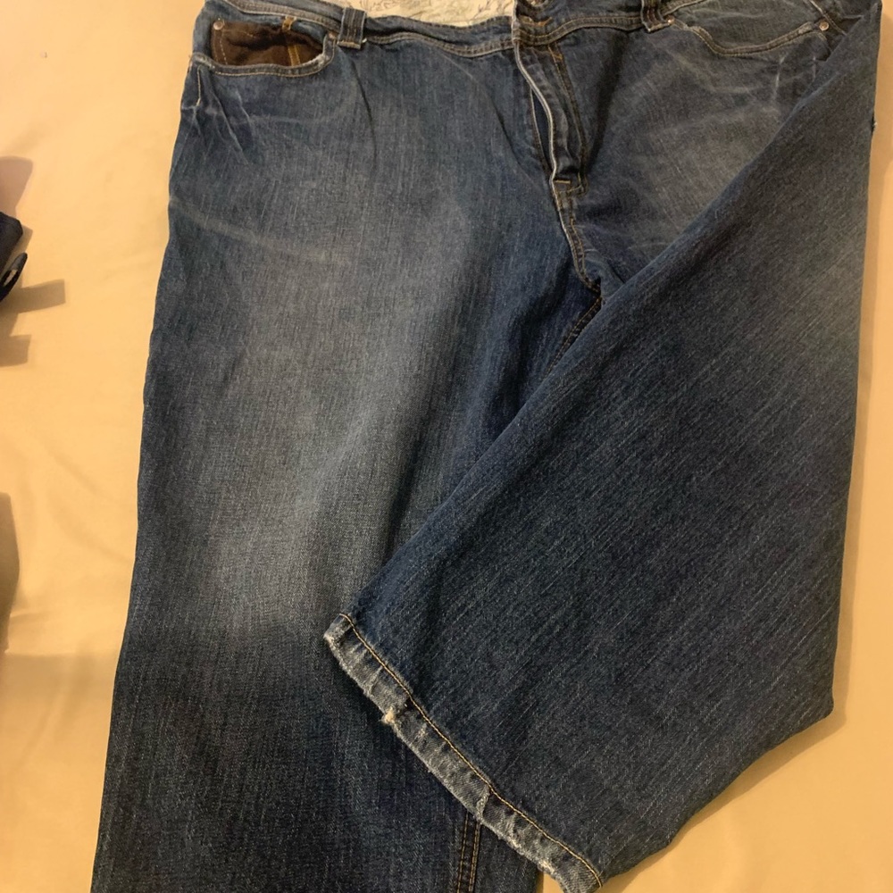 Supreme Jean Capri size 22. Brown design on back pocket